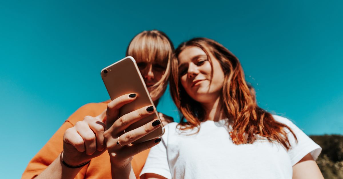 Artist reposting a fan’s cover song video on TikTok and Instagram to build community and loyalty