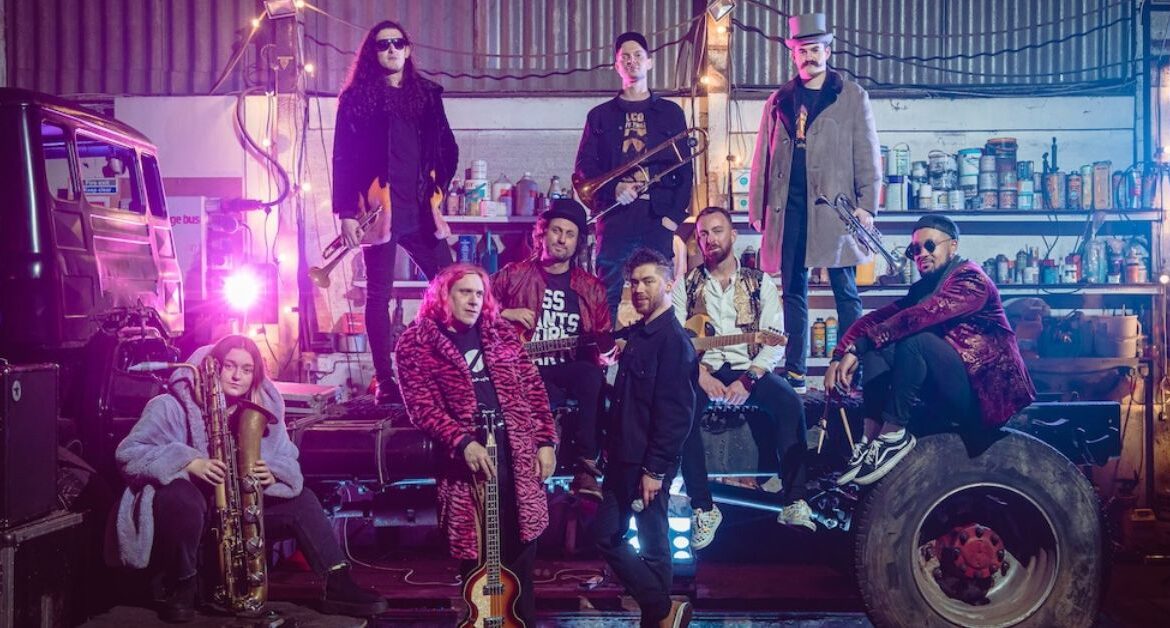 Big Band of Boom performing live on UK tour with full brass section, heavy guitars and festival crowd energy